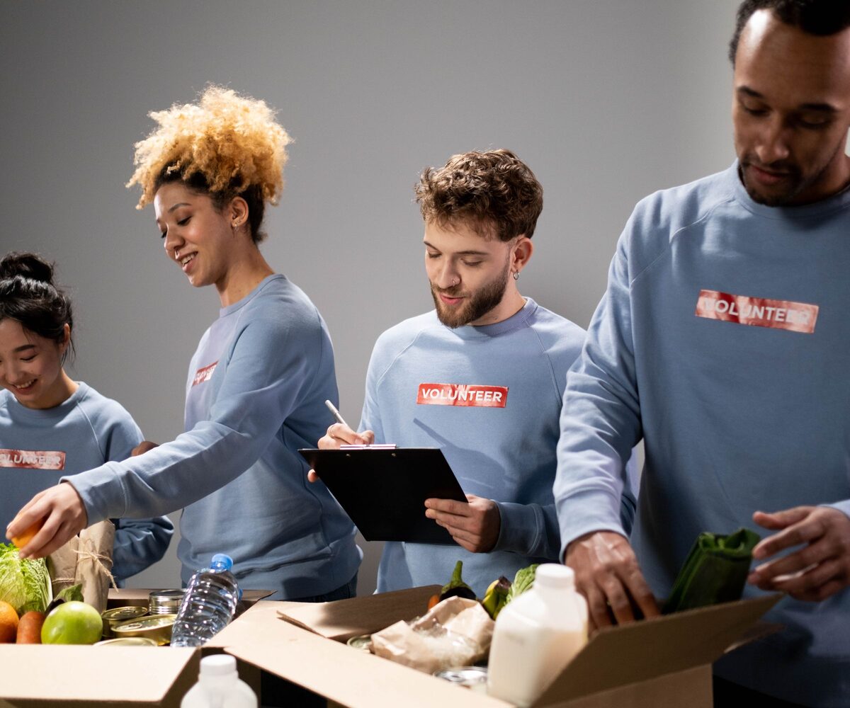 Volunteers packing donations together for a nonprofit campaign